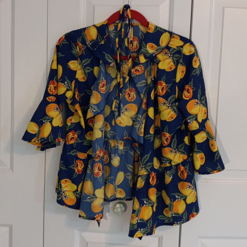 Ruffled blue blouse with lemons, size L